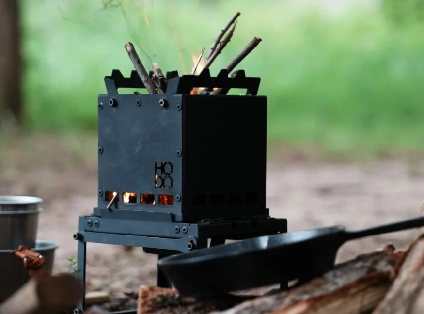 Camping Tent Stove vs. Fire Pit: Which Puts Out More BTUs?