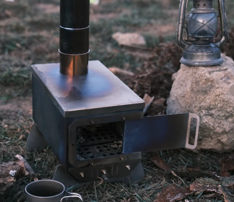 Camping Tent Stove vs. Fire Pit: Which Puts Out More BTUs?
