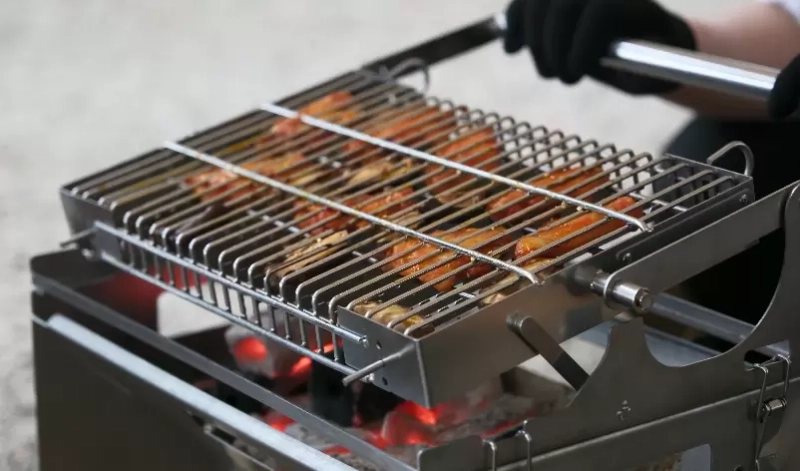 Lightweight Rotating Camping Grill for Outdoor Enthusiasts: Stainless Steel & Easy Setup